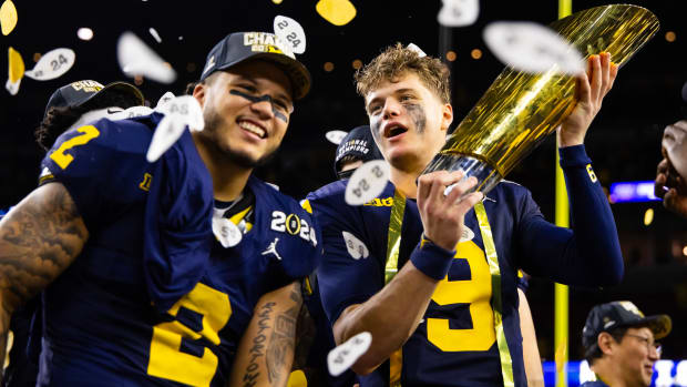 Corum and McCarthy after No. 1 Michigan's 34-13 win over No. 2 Washington in the national championship on Jan. 8, 2024.