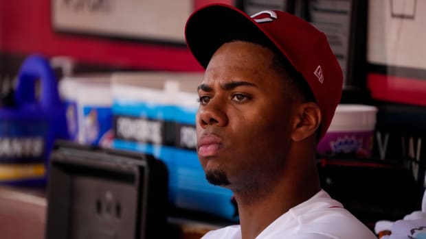 Cincinnati Reds starting pitcher Hunter Greene (21) watches from the bench in the eighth inning of the MLB Interleague game between the Cincinnati Reds and the Minnesota Twins at Great American Ball Park in downtown Cincinnati on Wednesday, Sept. 20, 2023. 