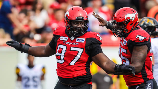 Sep 14, 2019; Calgary, Alberta, CAN; Calgary Stampeders defensive lineman Derek Wiggan (97) reacts in the second half against the Hamilton Tiger-Cats during a Canadian Football League game at McMahon Stadium. Mandatory Credit: Sergei Belski-USA TODAY Sports  