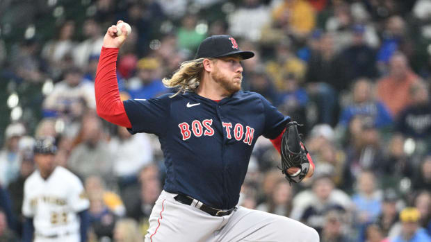 Apr 23, 2023; Milwaukee, Wisconsin, USA; Boston Red Sox relief pitcher Kaleb Ort (61) delivers against the Milwaukee Brewers in the eighth inning at American Family Field. Mandatory Credit: Michael McLoone-USA TODAY Sports