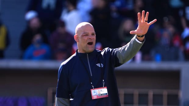 Feb 5, 2022; Las Vegas, NV, USA; Tennessee Titans strength and conditioning coach Frank Piraino gestures during AFC practice at the Las Vegas Ballpark.