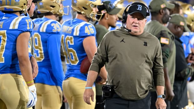 UCLA Bruins head coach Chip Kelly walks along the sideline during the first half against the Arizona State Sun Devils at the Rose Bowl in Pasadena, Calif., on Nov. 11, 2023.