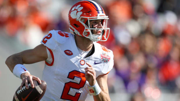 Clemson Tigers quarterback Cade Klubnik on a rushing attempt during a college football game in the ACC.