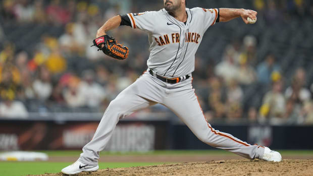Aug 31, 2023; San Diego, California, USA; San Francisco Giants relief pitcher Scott Alexander (54) throws a pitch against against the San Diego Padres during the ninth inning at Petco Park.