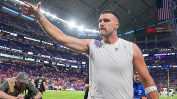 Oct 8, 2023; Minneapolis, Minnesota, USA; Kansas City Chiefs tight end Travis Kelce (87) salutes the fans after the game against the Minnesota Vikings at U.S. Bank Stadium.