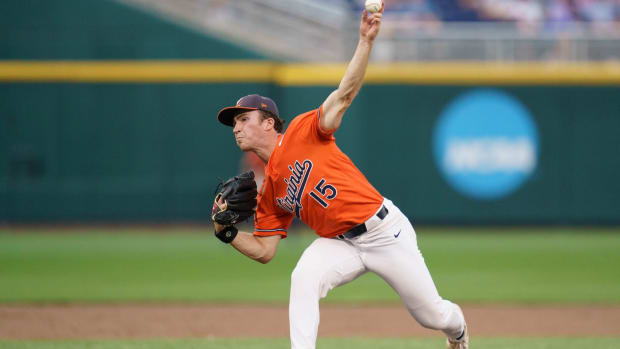 Evan Blanco delivers a pitch during the Virginia baseball game against Florida at the College World Series in Omaha.