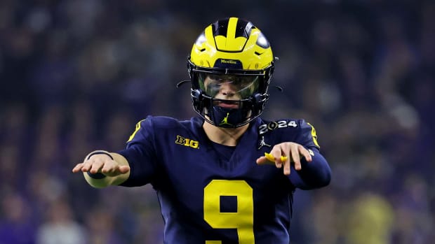 Jan 8, 2024; Houston, TX, USA; Michigan Wolverines quarterback J.J. McCarthy (9) reacts during the second quarter against the Washington Huskies in the 2024 College Football Playoff national championship game at NRG Stadium. Mandatory Credit: Troy Taormina-USA TODAY Sports