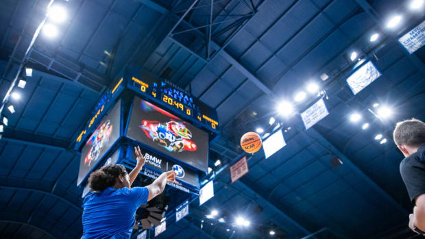 A Kansas Jayhawk player warms up before the game against the Houston Cougars.