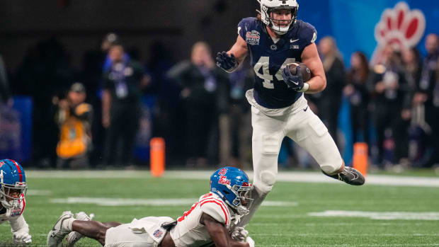 Penn State tight end Tyler Warren catches a pass against Ole Miss in the 2023 Peach Bowl at Mercedes-Benz Stadium.