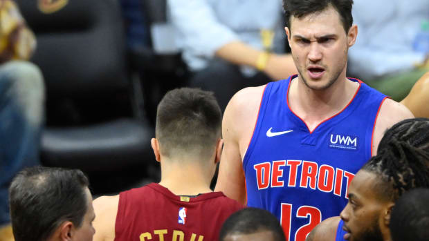 Jan 31, 2024; Cleveland, Ohio, USA; Detroit Pistons forward Danilo Gallinari (12) reacts after a play against Cleveland Cavaliers guard Max Strus (1) in the fourth quarter at Rocket Mortgage FieldHouse.