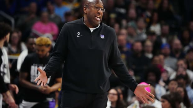 Feb 14, 2024; Denver, Colorado, USA; Sacramento Kings head coach Mike Brown reacts in the first half against the Denver Nuggets at Ball Arena. Mandatory Credit: Ron Chenoy-USA TODAY Sports  