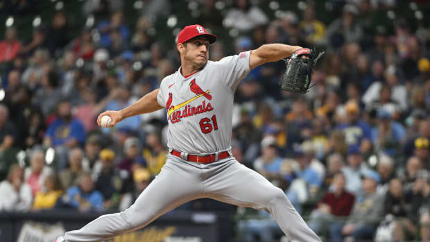 Sep 28, 2023; Milwaukee, Wisconsin, USA; St. Louis Cardinals relief pitcher Jacob Barnes (61) delivers a pitch against the Milwaukee Brewers in the seventh inning at American Family Field.