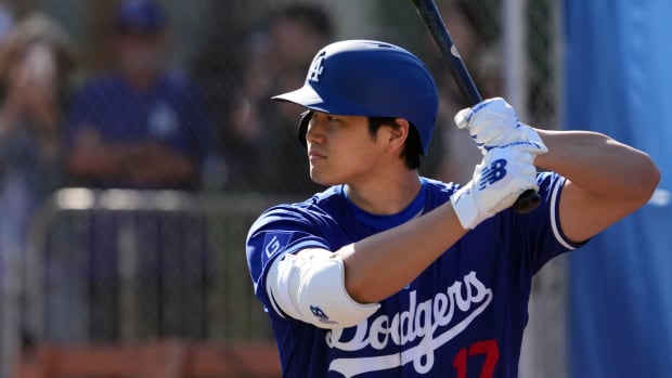 Feb 15, 2024; Glendale, AZ, USA; Los Angeles Dodgers designated hitter Shohei Ohtani (17) stands in as a batter during pitcher drills during a Spring Training workout at Camelback Ranch.