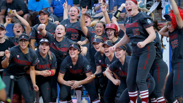 Stanford celebrates the home run by Sydney Steele (32) in the seventh inning during a softball game between Alabama and Stanford in the Women's College World Series at USA Softball Hall of Fame Stadium in in Oklahoma City, Friday, June, 2, 2023.