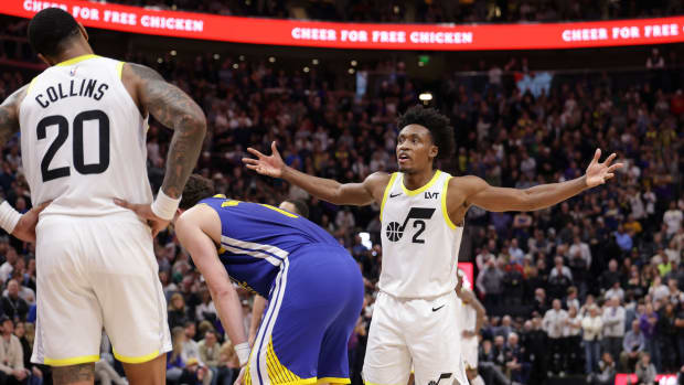 Feb 15, 2024; Salt Lake City, Utah, USA; Utah Jazz guard Collin Sexton (2) and Utah Jazz forward John Collins (20) react at the end of the game against the Golden State Warriors at Delta Center.