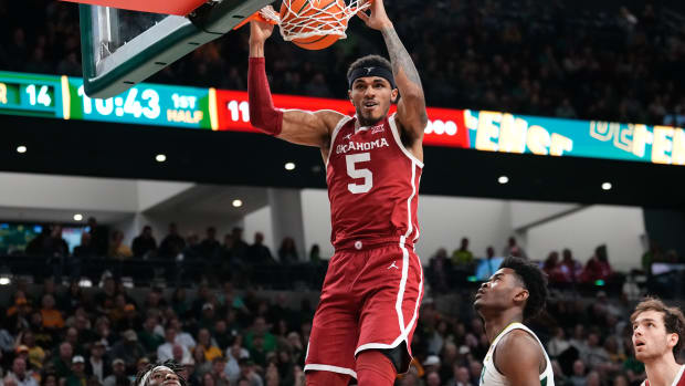 Feb 13, 2024; Waco, Texas, USA; Oklahoma Sooners guard Rivaldo Soares (5) dunks the ball against the Baylor Bears during the first half at Paul and Alejandra Foster Pavilion.
