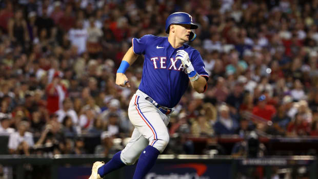 Texas Rangers third baseman Josh Jung sustained a low-grade left calf strain early in camp and will be out for a minimum of three weeks while recovering this spring.