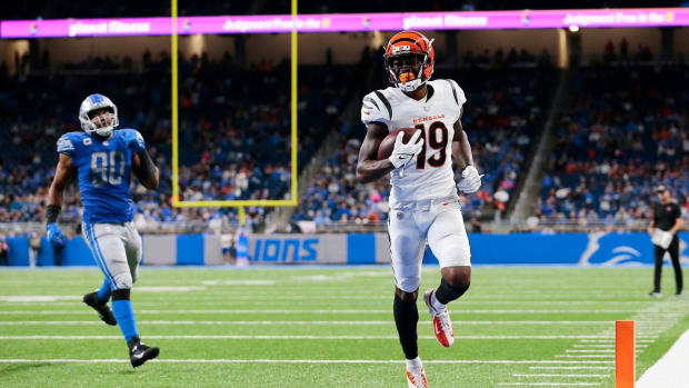 Oct 17, 2021; Cincinnati, OH, USA; Cincinnati Bengals wide receiver Auden Tate (19) catches a short pass and runs in for a touchdown in the fourth quarter of the NFL Week 6 game between the Detroit Lions and the Cincinnati Bengals at Ford Field in Detroit on Sunday, Oct. 17, 2021. Mandatory Credit: Sam Greene-USA TODAY Sports  