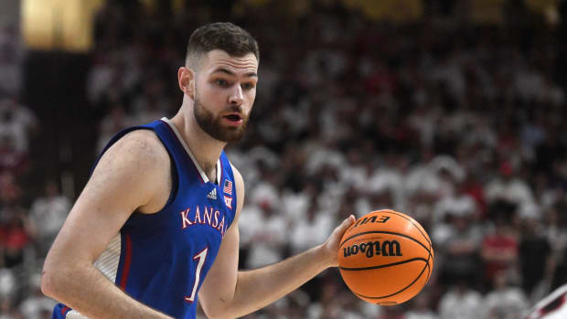 Kansas' center Hunter Dickinson (1) looks to pass the ball against Texas Tech in a Big 12 basketball game, Monday, Feb. 12, 2024, at United Supermarkets Arena.  