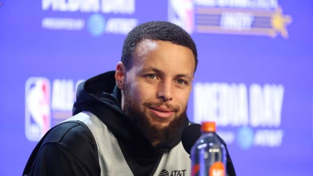 Feb 17, 2024; Indianapolis, IN, USA; Western Conference guard Stephen Curry (30) of the Golden State Warriors talk to the press during NBA All Star practice at Gainbridge Fieldhouse.