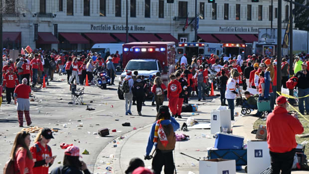 Feb 14, 2024; Kansas City, MO, USA; Fans leave the area after shots were fired after the celebration of the Kansas City Chiefs winning Super Bowl LVIII. Mandatory Credit: David Rainey-USA TODAY Sports  