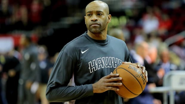 Former guard Vince Carter looks on while warming up before an Atlanta Hawks game.