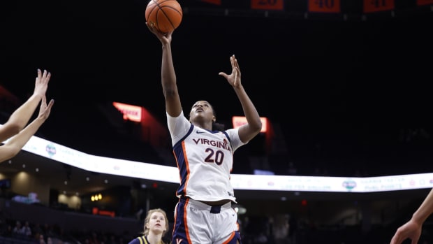 Camryn Taylor attempts a layup during the Virginia women's basketball game against Notre Dame at John Paul Jones Arena.