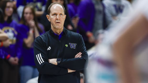 Mike Hopkins watches the UW-Cal game unfold.