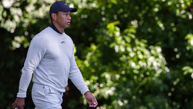 Tiger Woods walks at the 12th hole during the first round of the 2024 Genesis Invitational.