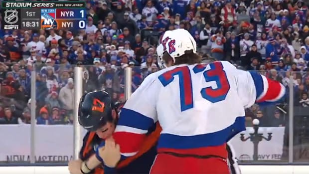 New York Rangers rookie Matt Rempe brawls with New York Islanders winger Matt Martin