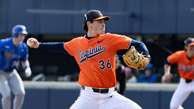 Bryson Moore delivers a pitch during the Virginia baseball game against Hofstra at Disharoon Park.