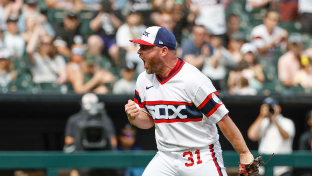 Jun 4, 2023; Chicago, Illinois, USA; Chicago White Sox relief pitcher Liam Hendriks (31) reacts after striking out Detroit Tigers third baseman Tyler Nevin (18) during the ninth inning at Guaranteed Rate Field.