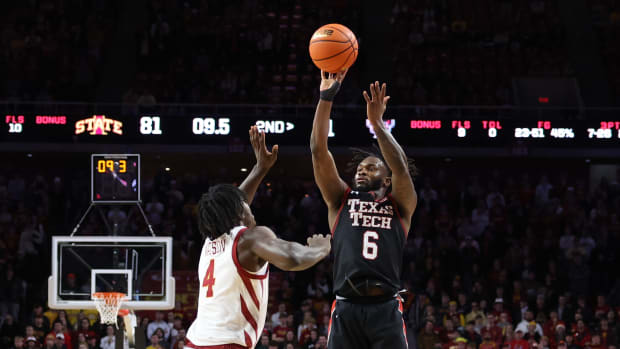 Feb 17, 2024; Ames, Iowa, USA; Texas Tech Red Raiders guard Joe Toussaint (6) shoots the ball over Iowa State Cyclones guard Demarion Watson (4) during the second half at James H. Hilton Coliseum. Mandatory Credit: Reese Strickland-USA TODAY Sports
