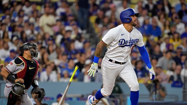 Oct 7, 2023; Los Angeles, California, USA; Los Angeles Dodgers left fielder David Peralta (6) hits a double against the Arizona Diamondbacks during the second inning for game one of the NLDS for the 2023 MLB playoffs at Dodger Stadium. Mandatory Credit: Jayne Kamin-Oncea-USA TODAY Sports