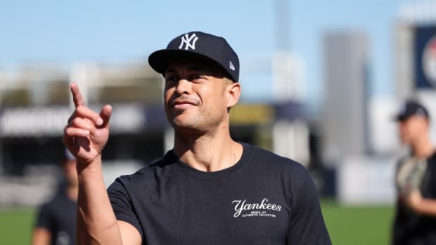 Feb 19, 2024; Tampa, FL, USA; New York Yankees outfielder Giancarlo Stanton (27) participates in spring training workouts at George M. Steinbrenner Field.