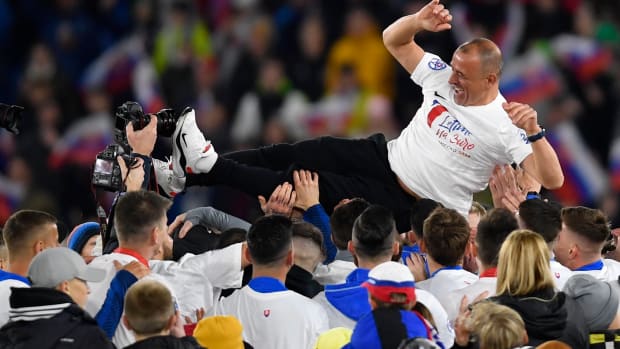 Slovakia manager Francesco Calzona pictured celebrating with his team in November 2023 after they qualified for Euro 2024