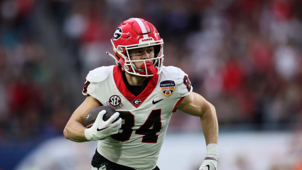Dec 30, 2023; Miami Gardens, FL, USA; Georgia Bulldogs wide receiver Ladd McConkey (84) makes a catch and runs for touchdown against the Florida State Seminoles during the first half in the 2023 Orange Bowl at Hard Rock Stadium. Mandatory Credit: Sam Navarro-USA TODAY Sports  