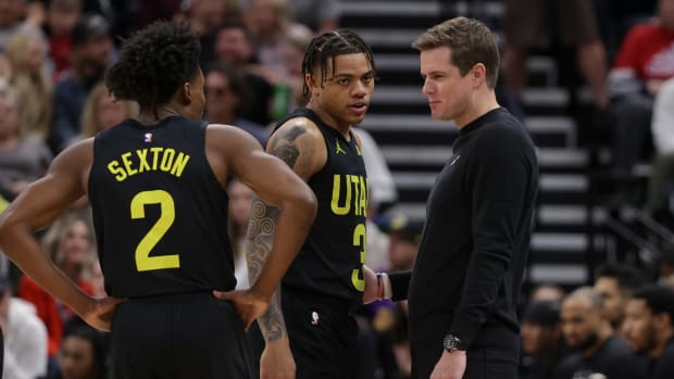 Feb 14, 2024; Salt Lake City, Utah, USA; Utah Jazz head coach Will Hardy talks to guard Keyonte George (3) and guard Collin Sexton (2) during the first quarter at Delta Center. Mandatory Credit: Chris Nicoll-USA TODAY Sports