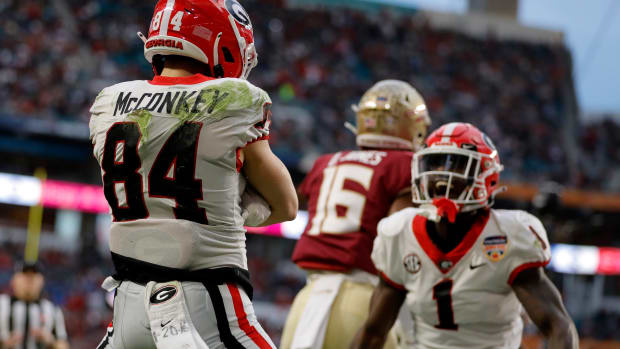 Dec 30, 2023; Miami Gardens, FL, USA; Georgia Bulldogs wide receiver Ladd McConkey (84) reacts after scoring a touchdown against the Florida State Seminoles during the first half in the 2023 Orange Bowl at Hard Rock Stadium. (Sam Navarro / USA TODAY Sports).