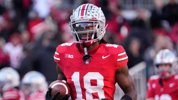 Nov 18, 2023; Columbus, Ohio, USA; Ohio State Buckeyes wide receiver Marvin Harrison Jr. (18) warms up prior to the NCAA football game against the Minnesota Golden Gophers at Ohio Stadium.
