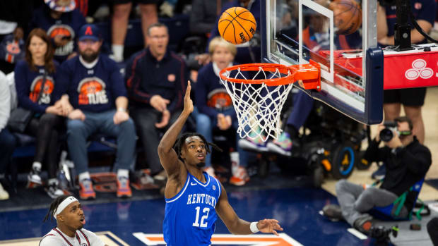 Kentucky Wildcats guard Antonio Reeves (12) goes up for a layup as Auburn Tigers take on Kentucky Wildcats at Neville Arena in Auburn, Ala., on Saturday, Feb. 17, 2024. Kentucky Wildcats defeated Auburn Tigers 70-59.