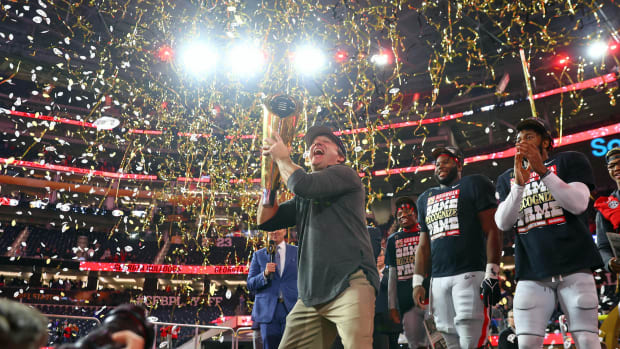 Jan 9, 2023; Inglewood, CA, USA; Georgia Bulldogs head coach Kirby Smart holds the trophy after winning the CFP national championship game against the TCU Horned Frogs at SoFi Stadium.
