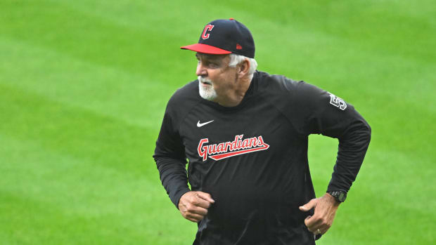 Sep 23, 2023; Cleveland, Ohio, USA; Cleveland Guardians pitching coach Carl Willis (51) runs on the field in the third inning against the Baltimore Orioles at Progressive Field.