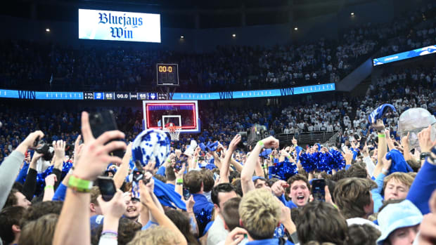 Feb 20, 2024; Omaha, Nebraska, USA; Creighton Bluejays fans storm the court after the win against the Connecticut Huskies at CHI Health Center Omaha.