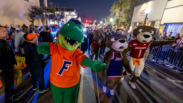 Feb 2, 2024; Mobile, AL, USA; Florida mascot Albert Gator helps lead off the Mardi Gras player parade Friday in downtown Mobile. Senior Bowl football players participated along with locals and NFL personnel. Mandatory Credit: Albert is joined by hometown mascots Miss Pawla and South Paw from the University of South Alabama. Vasha Hunt-USA TODAY Sports  