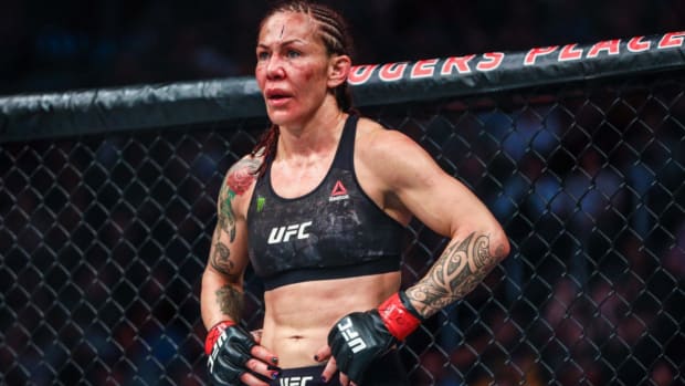 Jul 27, 2019; Edmonton, Alberta, Canada; Cris Cyborg (red gloves) during her fight against Felicia Spencer (blue gloves) during UFC 240 at Rogers Place. Mandatory Credit: Sergei Belski-USA TODAY Sports