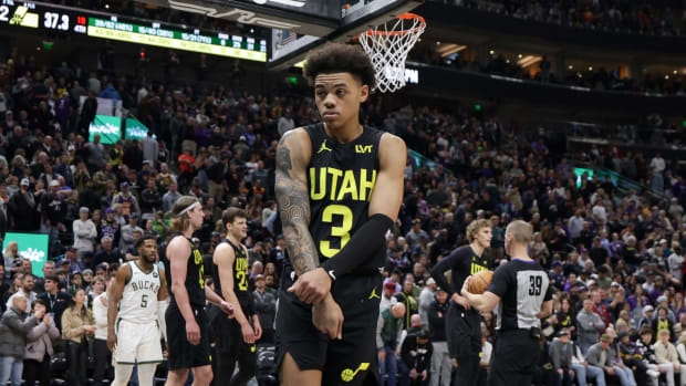 Feb 4, 2024; Salt Lake City, Utah, USA; Utah Jazz guard Keyonte George (3) makes an X with his arms during the second half against the Milwaukee Bucks at Delta Center. Mandatory Credit: Chris Nicoll-USA TODAY Sports