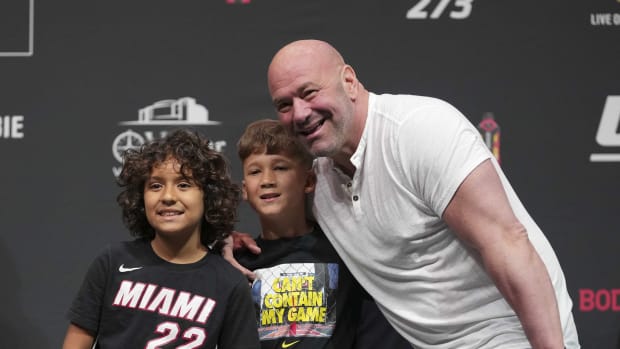 Apr 8, 2022; Jacksonville, FL, USA; Dana White (white shirt) with some young fans during weigh ins for UFC 273 at VyStar Veterans Memorial Stadium.
