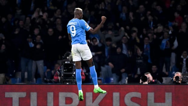 Victor Osimhen pictured celebrating after scoring for Napoli in a 1-1 draw with Barcelona in February 2024
