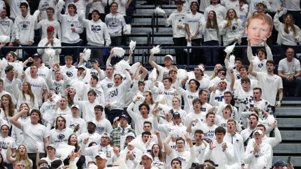 Penn State basketball fans cheer on the Nittany Lions during their game against No. 12 Illinois at Rec Hall.